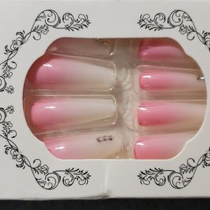 Pink and white ombre nails with rhinestones